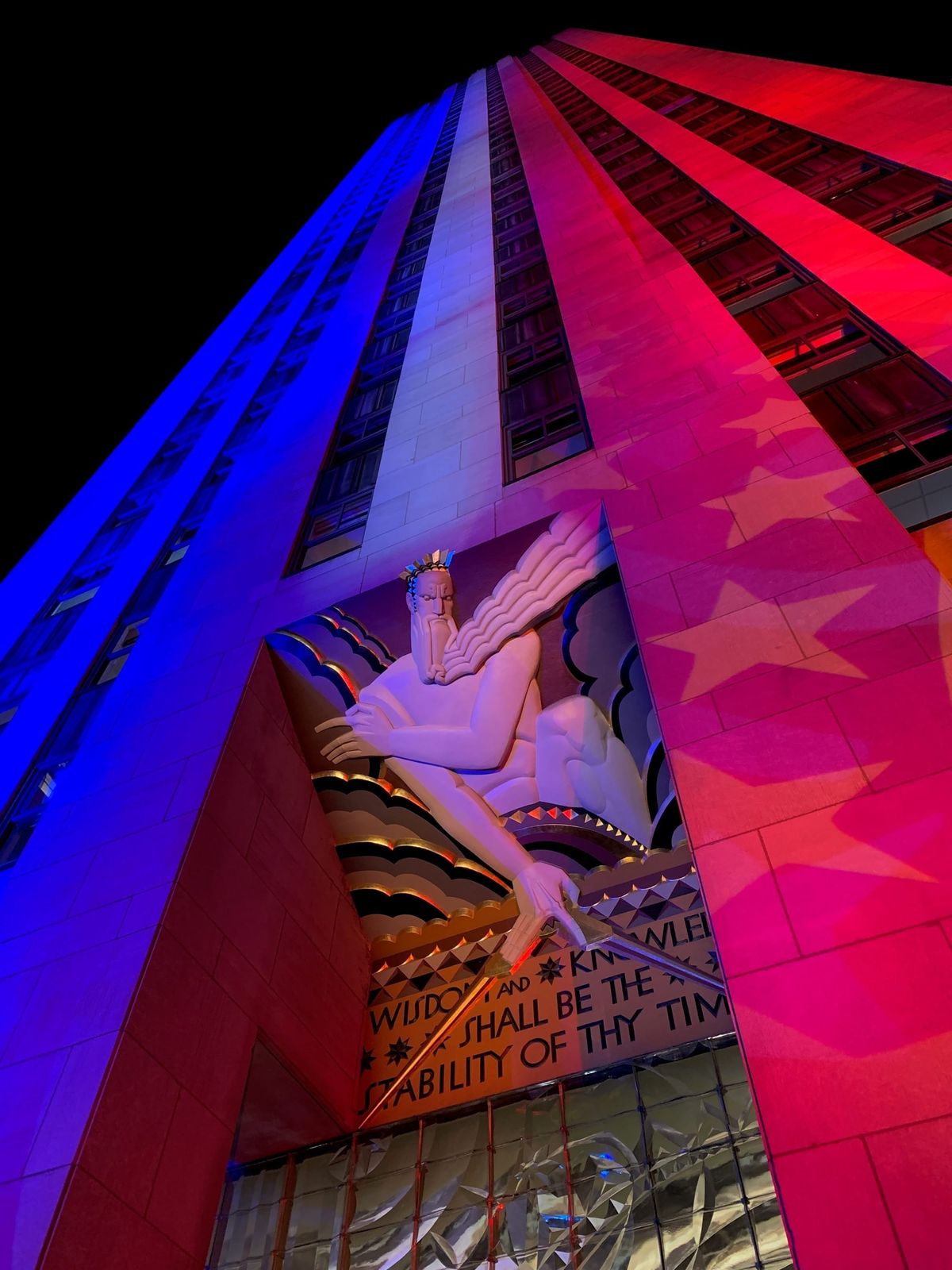 30 Rockefeller Center lit with star spangled banner graphics on election night 2018.