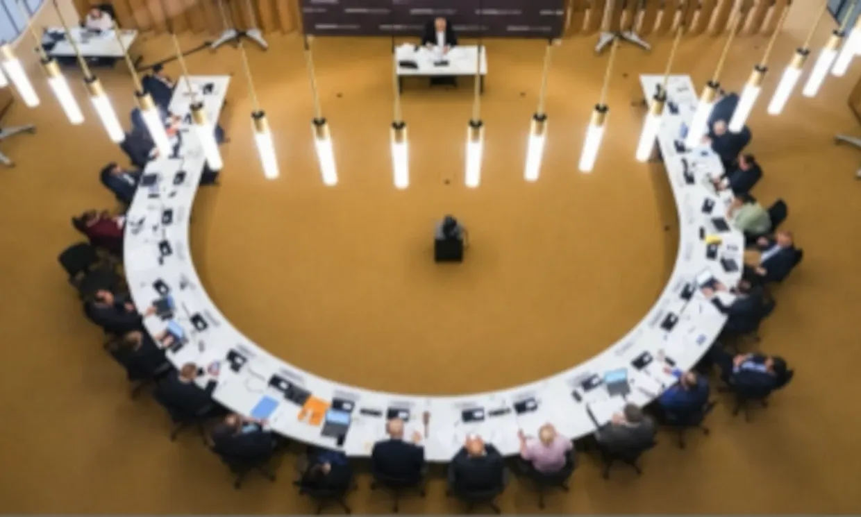 Birds eye view of the London Assembly horseshoe table