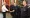 Sadiq Khan shakes the hand of members of the fire service