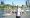 Sadiq Khan standing on the waterside smiling
