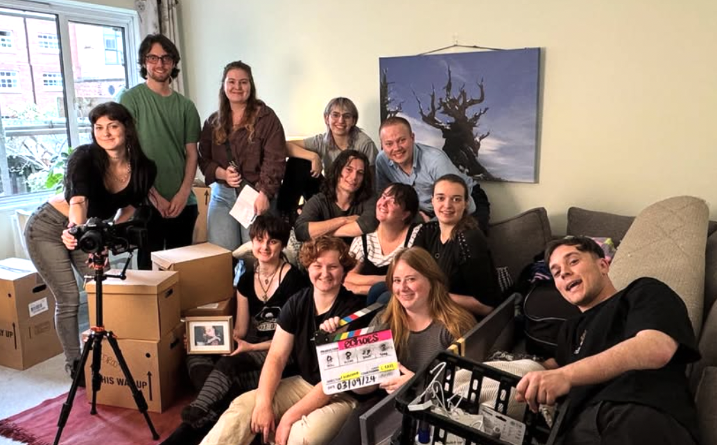 Film crew of Normal Girl Productions' first short film - group photo in a sitting room.