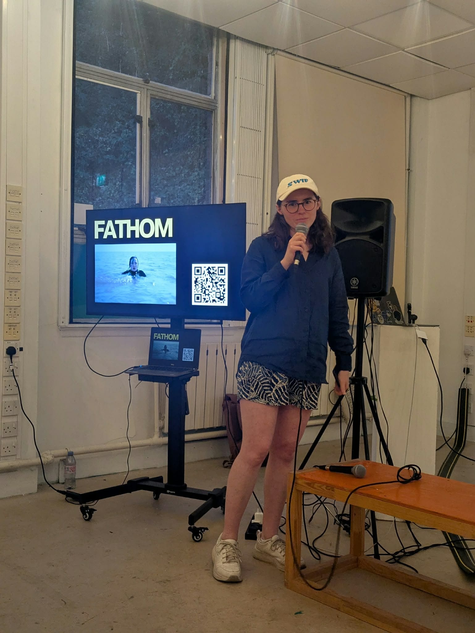 Me presenting films and staring daggers at the camera.