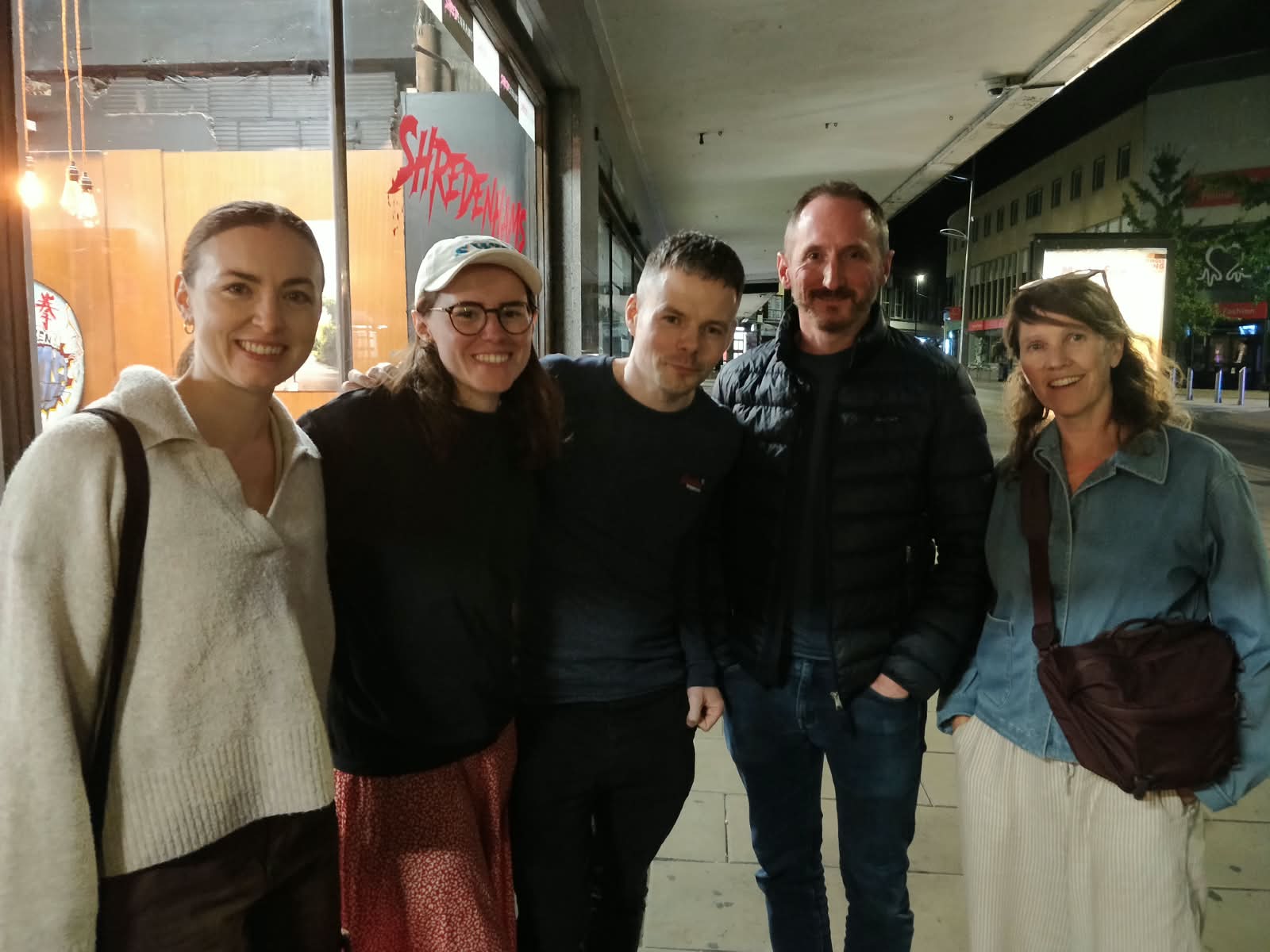 Five filmmakers in a group photo outside of Shredenhams Bristol.