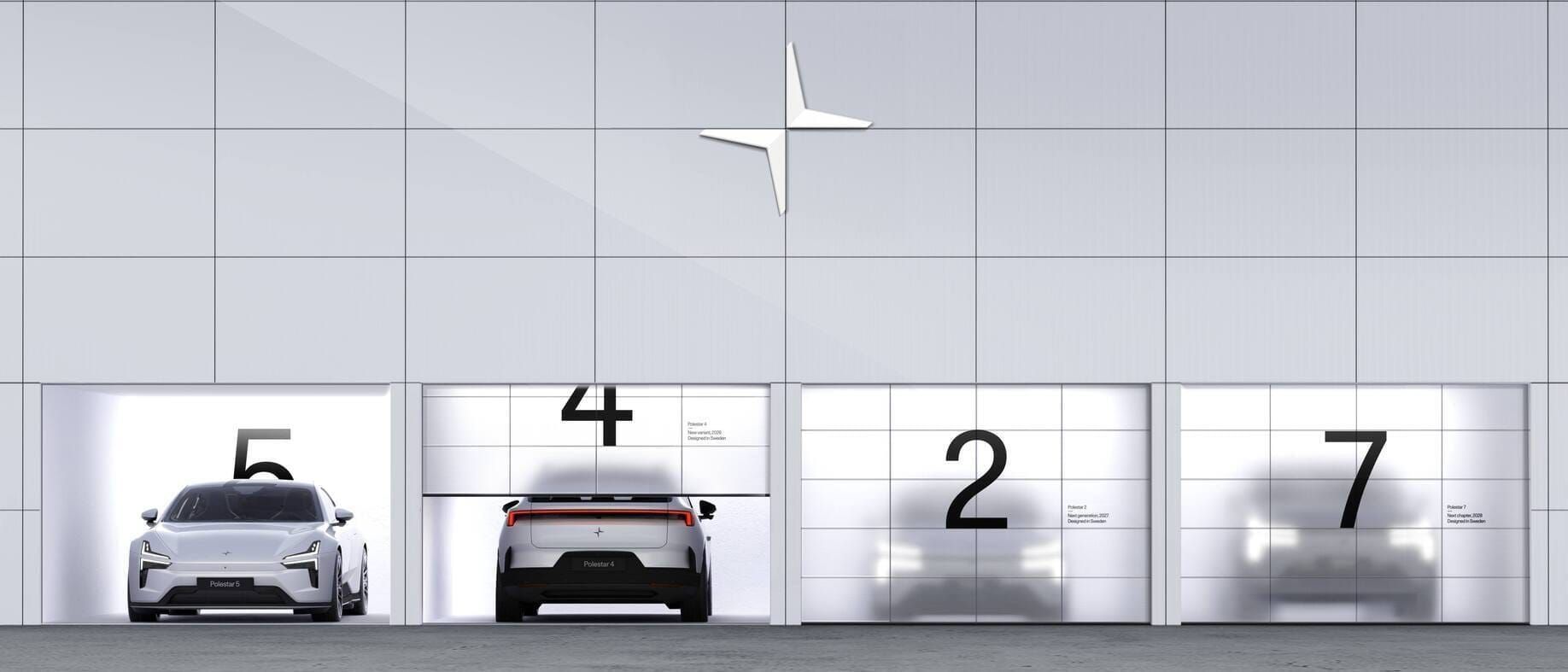 Ein Bild auf dem der neue Polestar 2 hinter einem verschlossenen Garagentor zu sehen ist. 