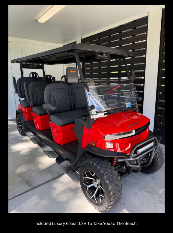 Red Denago Rover XXL six-seat golf cart included with the Island Lullaby Airbnb in Pawleys Island South Carolina