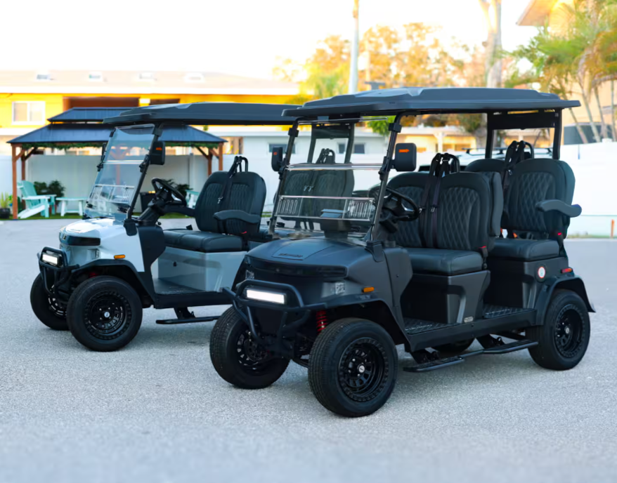 Two Denago golf carts included with a waterfront Airbnb condo rental
