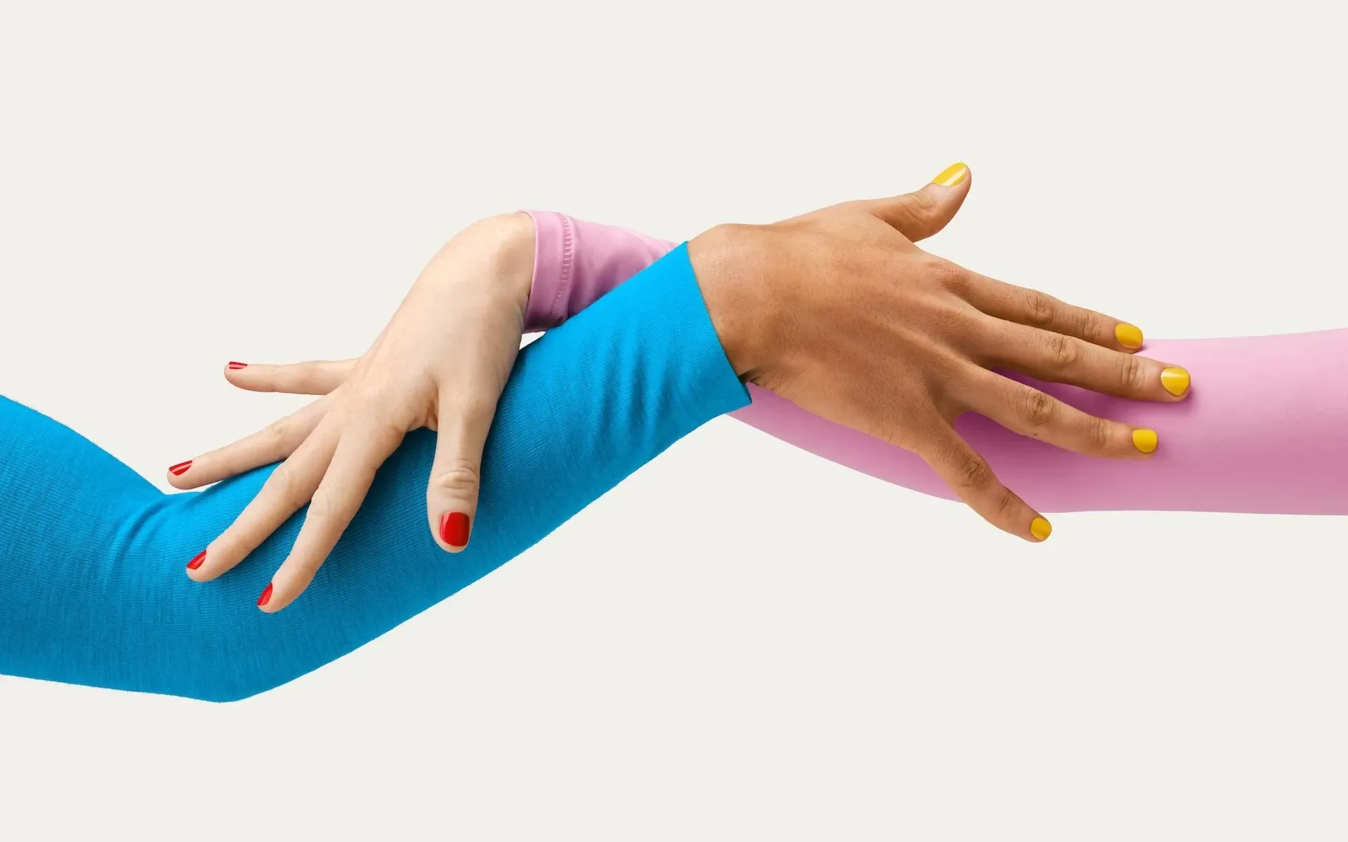 Two hands joining together