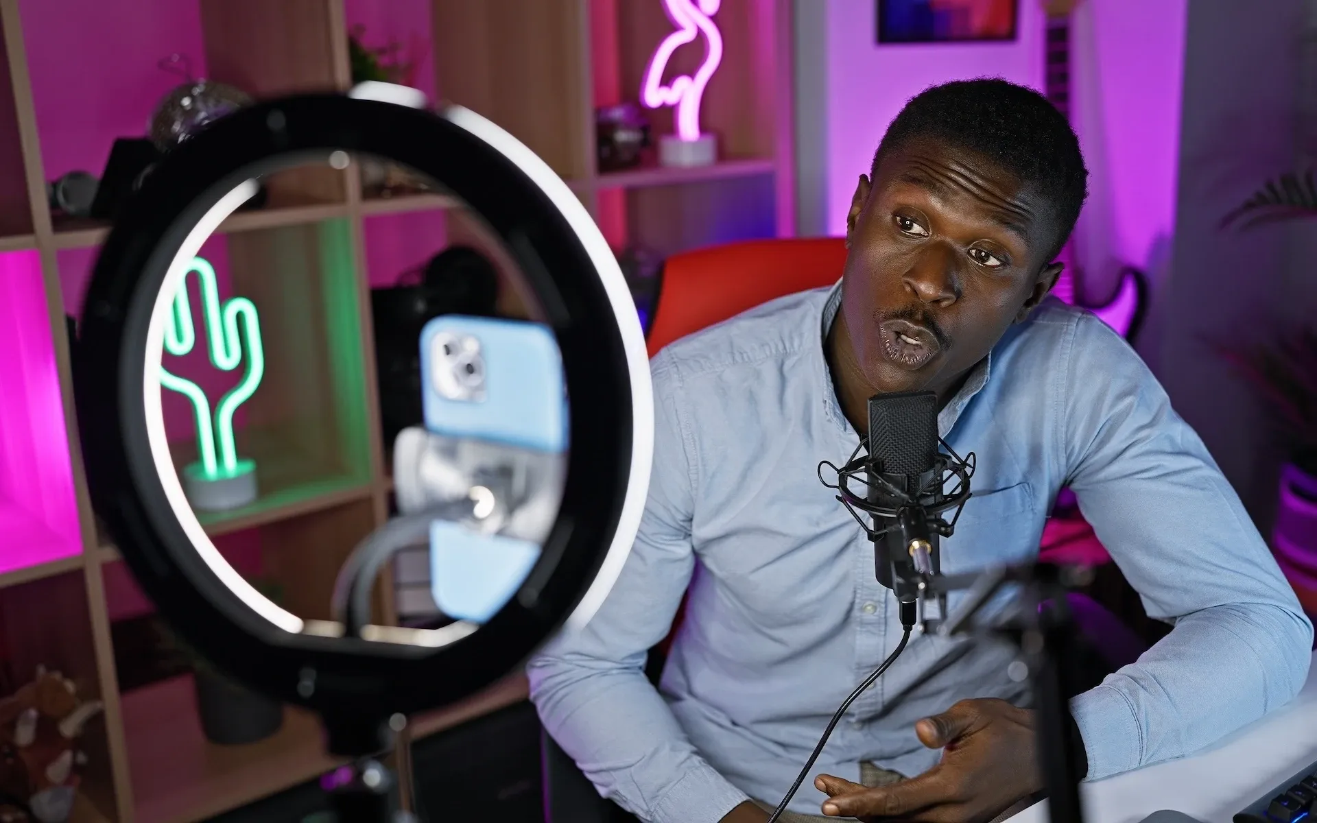 Man hosting a video podcast