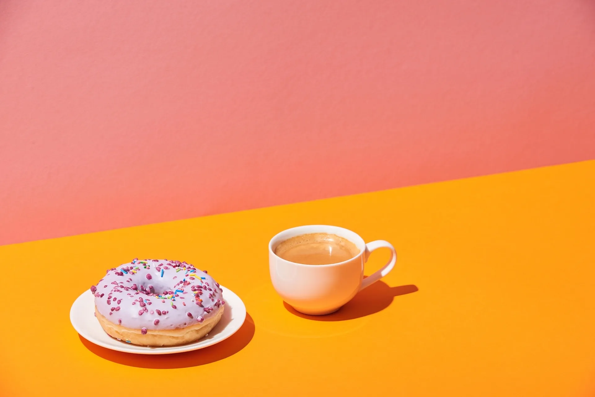 Coffee and donut on a table