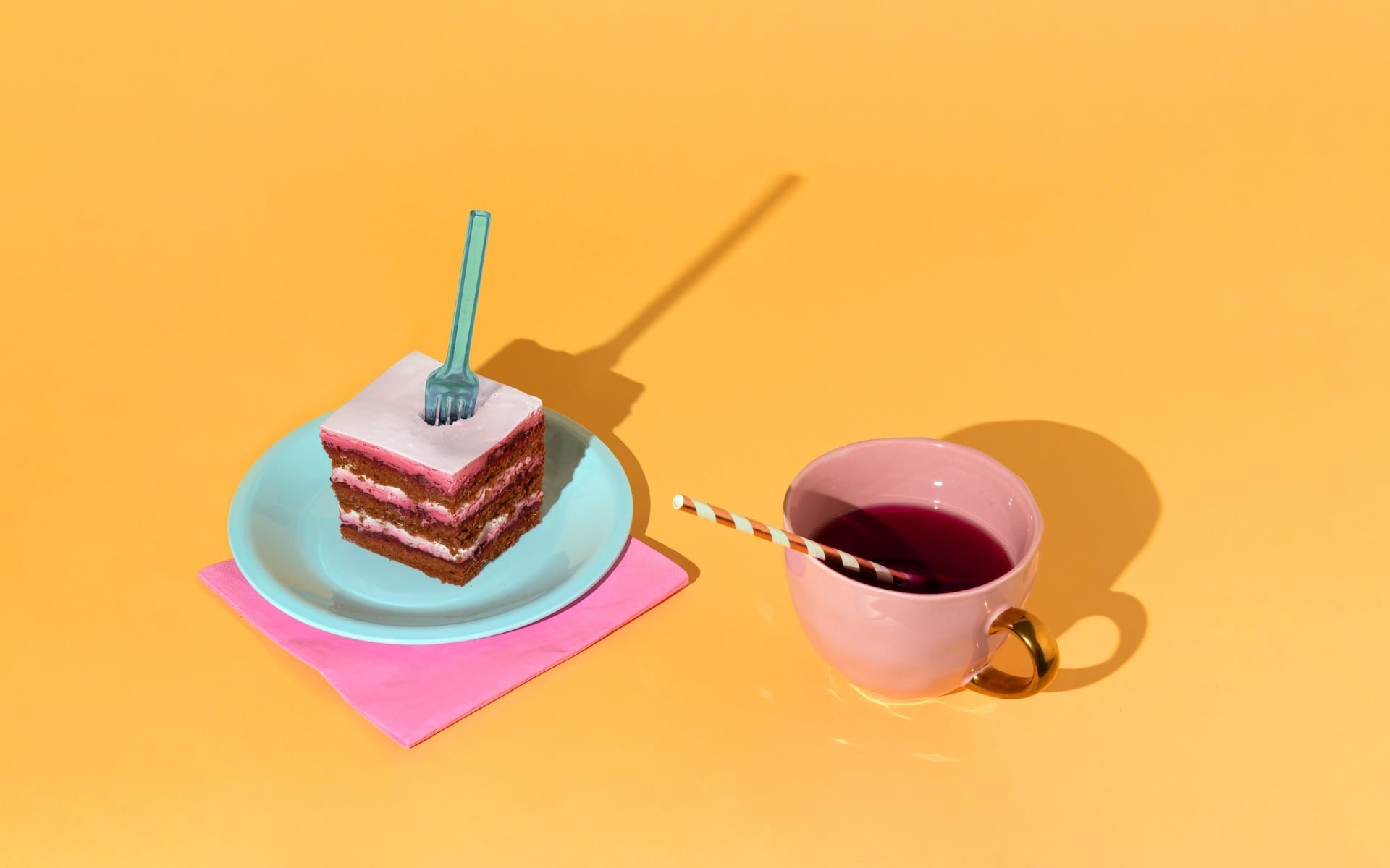 Cake and juice set out on a table