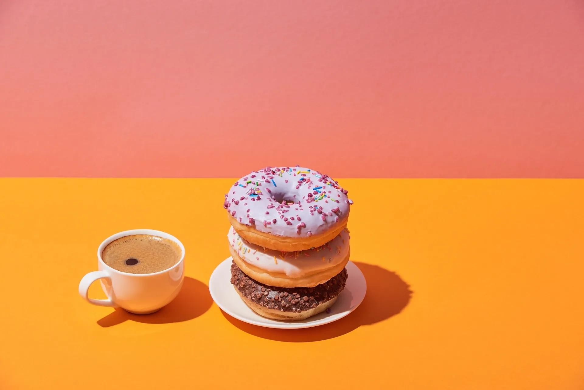 Donuts and coffee on a table