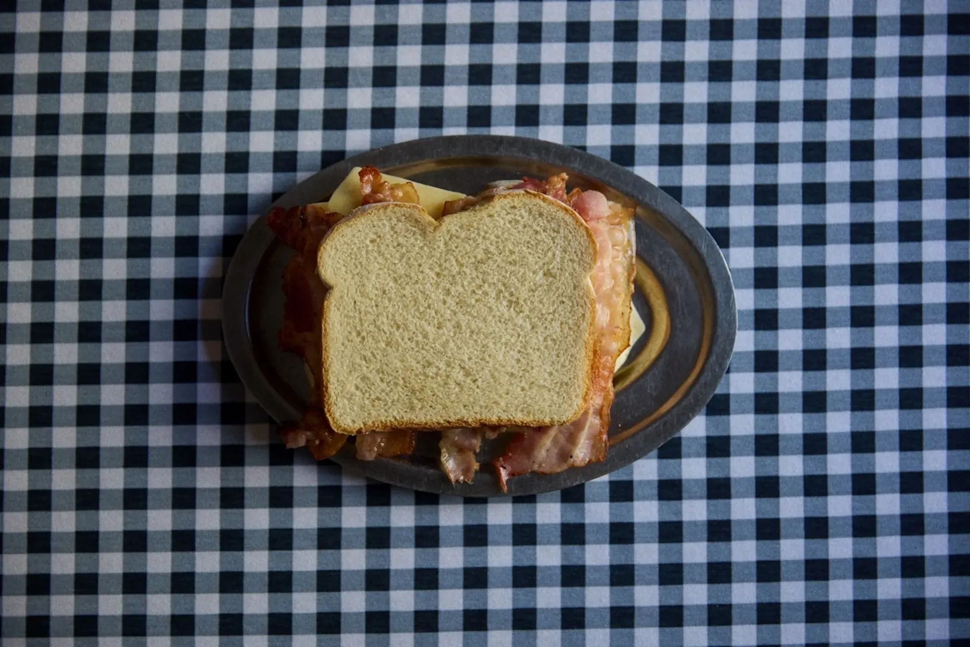 A bacon sandwich on a plate