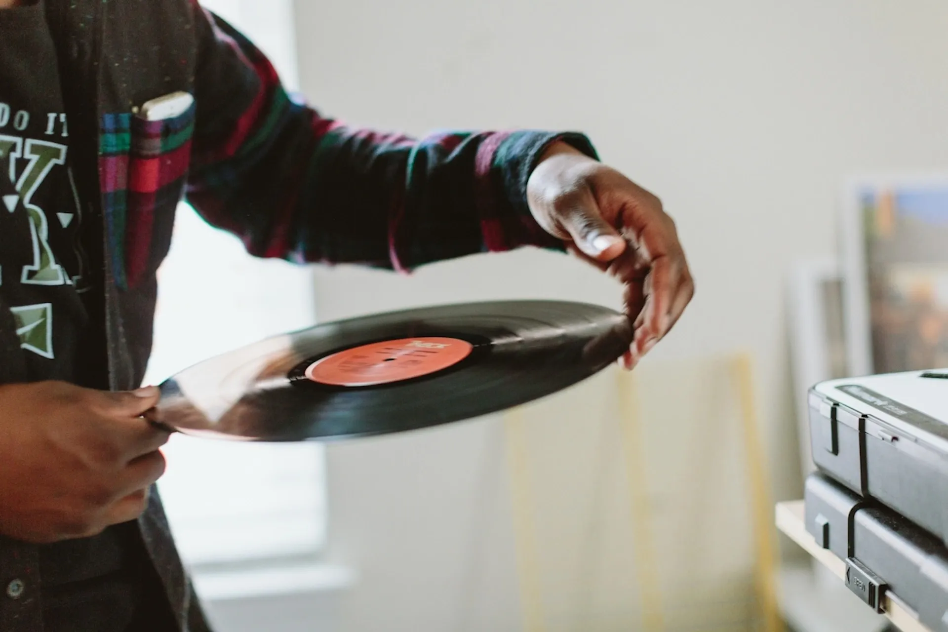 Person holding a record