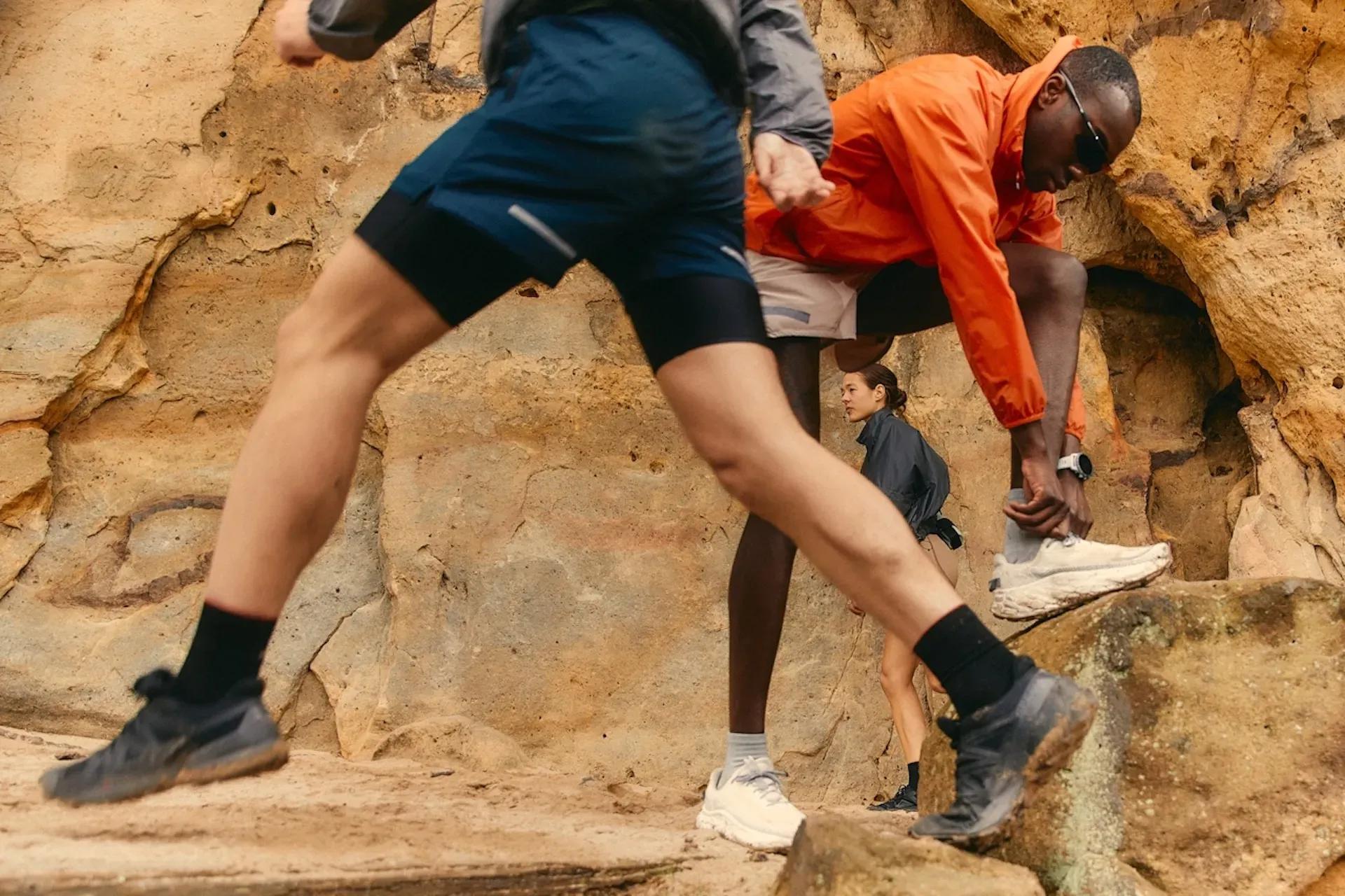 People preparing for a run in the mountains