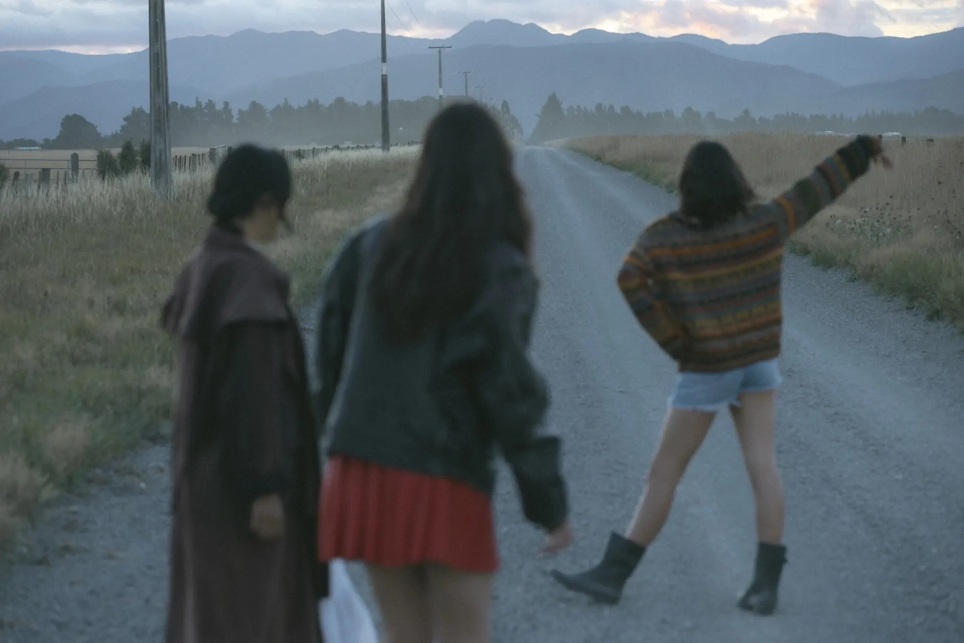 A group of friends hanging out in the countryside