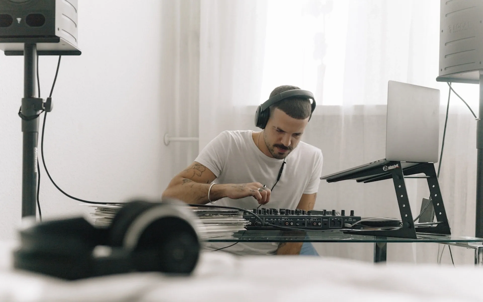 A DJ playing in their bedroom