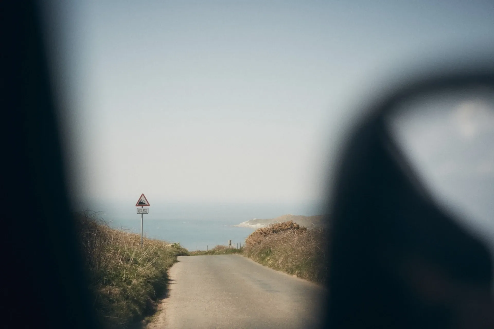 Driving in a car to the coast on a sunny day