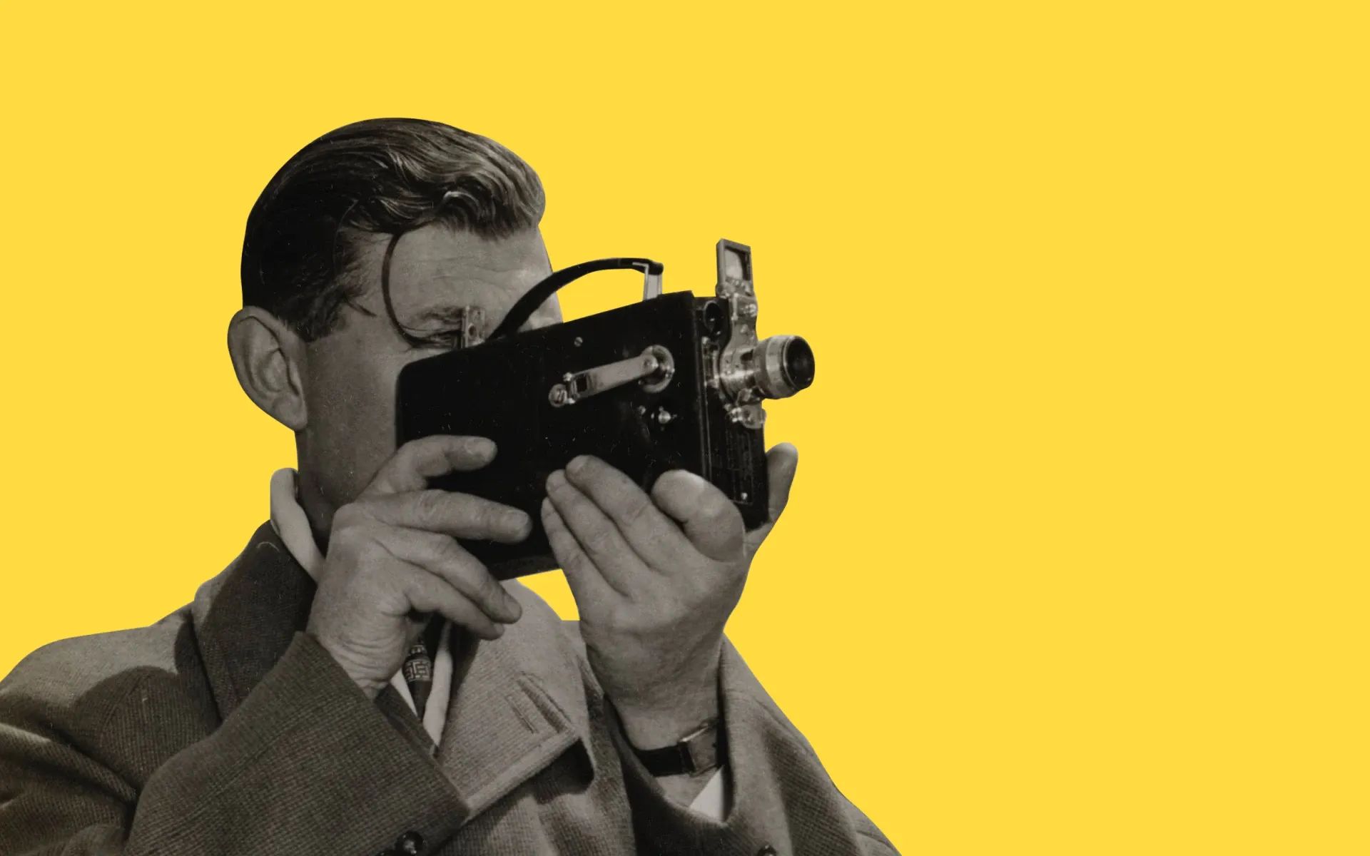 Man using an old-fashioned camera