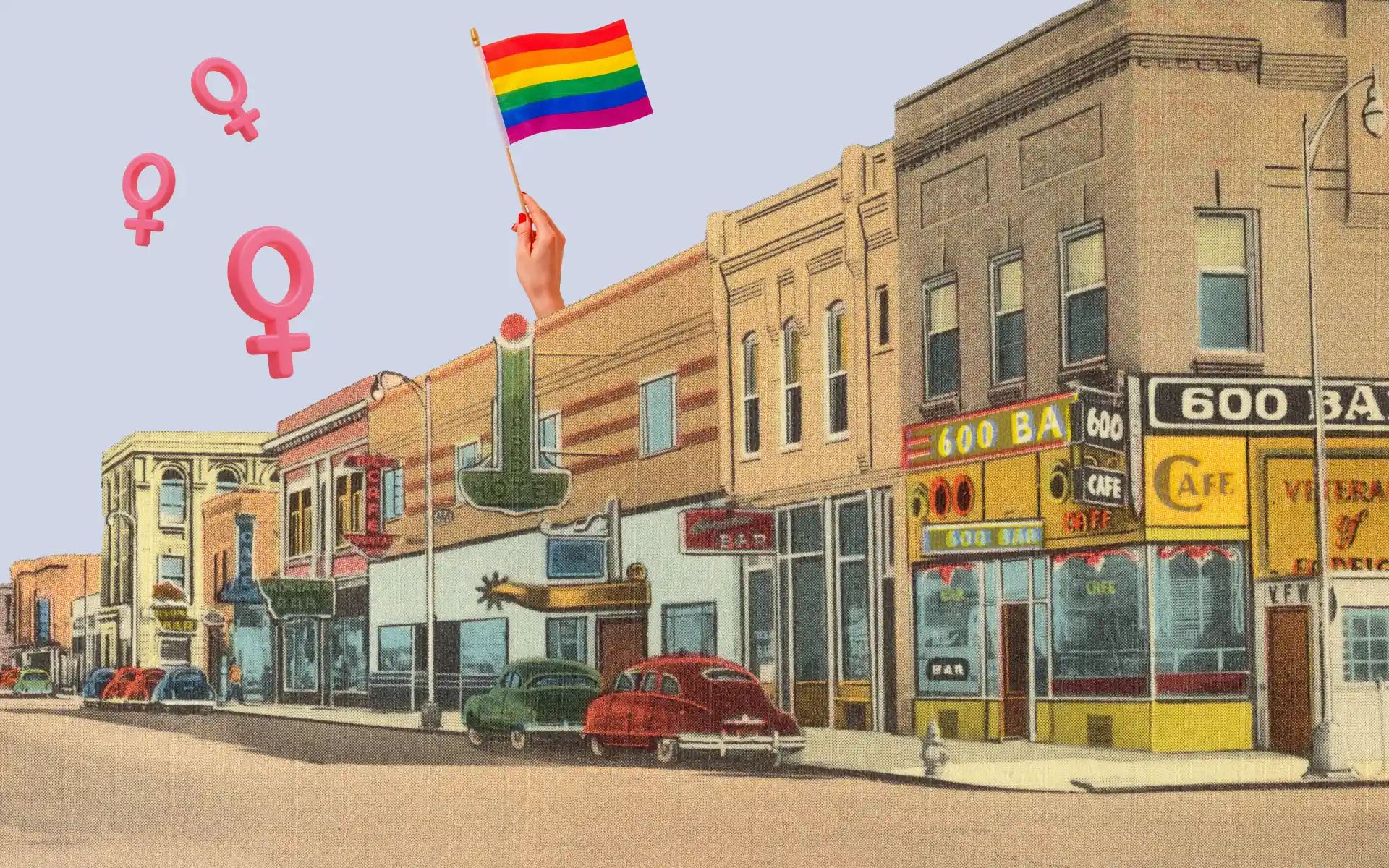 Old-fashioned street with a Pride flag waving above it