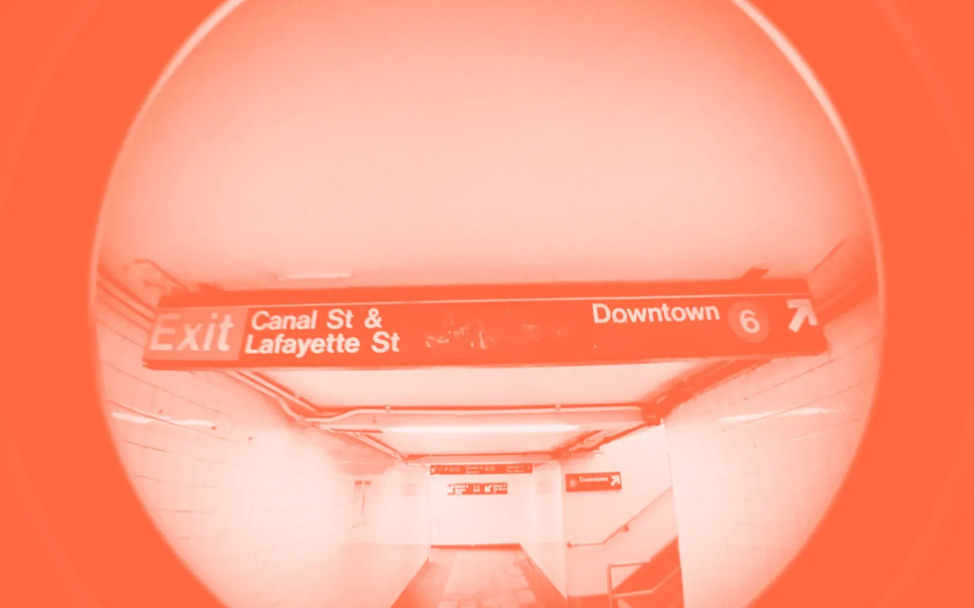 A fisheye lens view of a New York City subway station exit