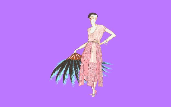 Woman standing with a fan made of feathers