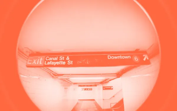 A fisheye lens view of a New York City subway station exit