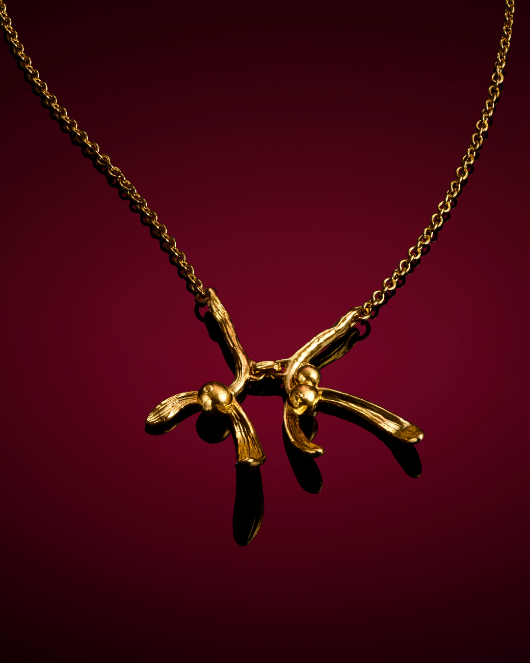 Menē 24k gold Mistletoe Necklace.