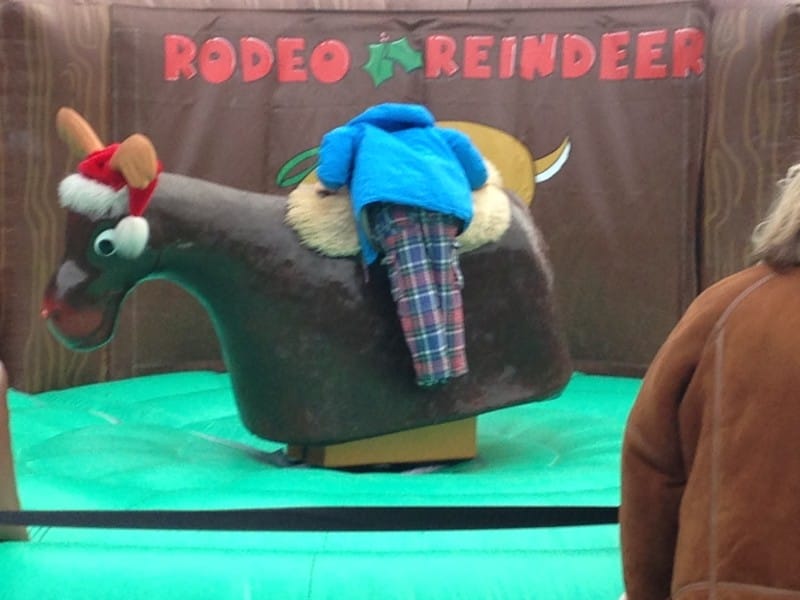 A child refused to give up and mounts the rodeo reindeer on Cinque Ports Street