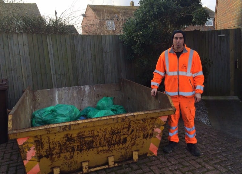 The Rye Steward with skip rapidly filling with the bags of rubbish