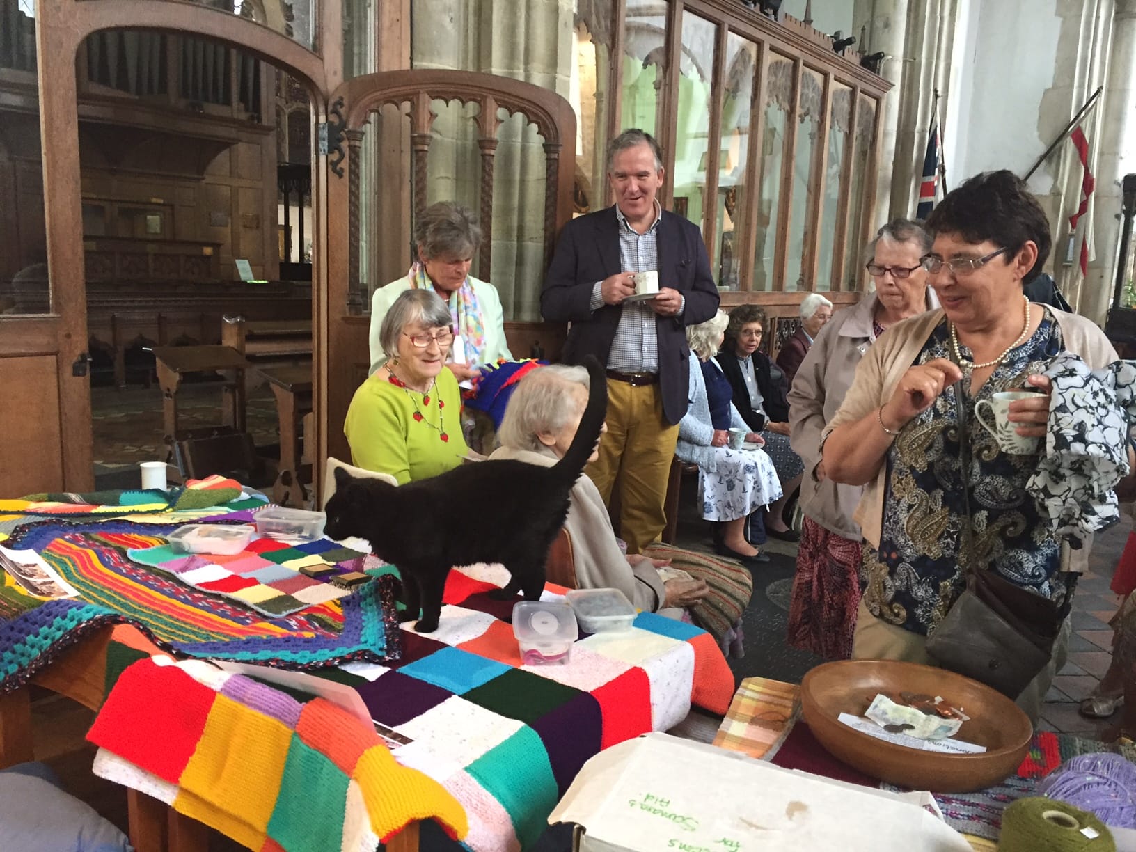 Church cat Sylvester Frost inspects the finished blankets