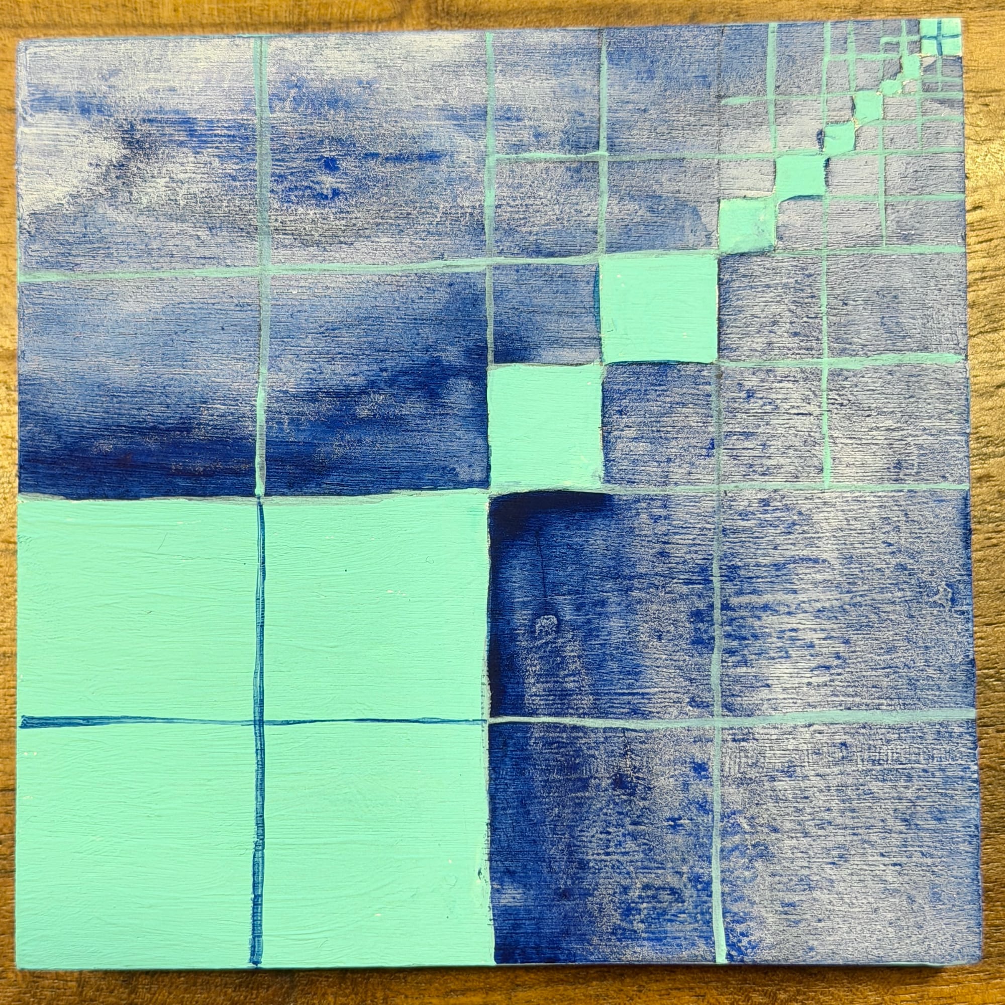 watercolor on wood of windows in windows with a diagonal teal with the rest blue.