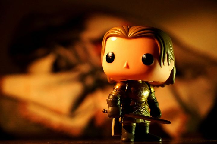 a funko pop knight in dark armor