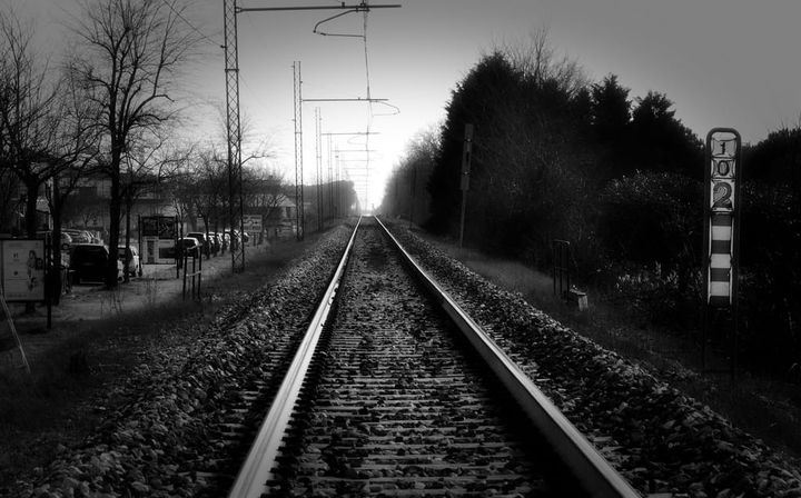 A long straight section of railroad tracks