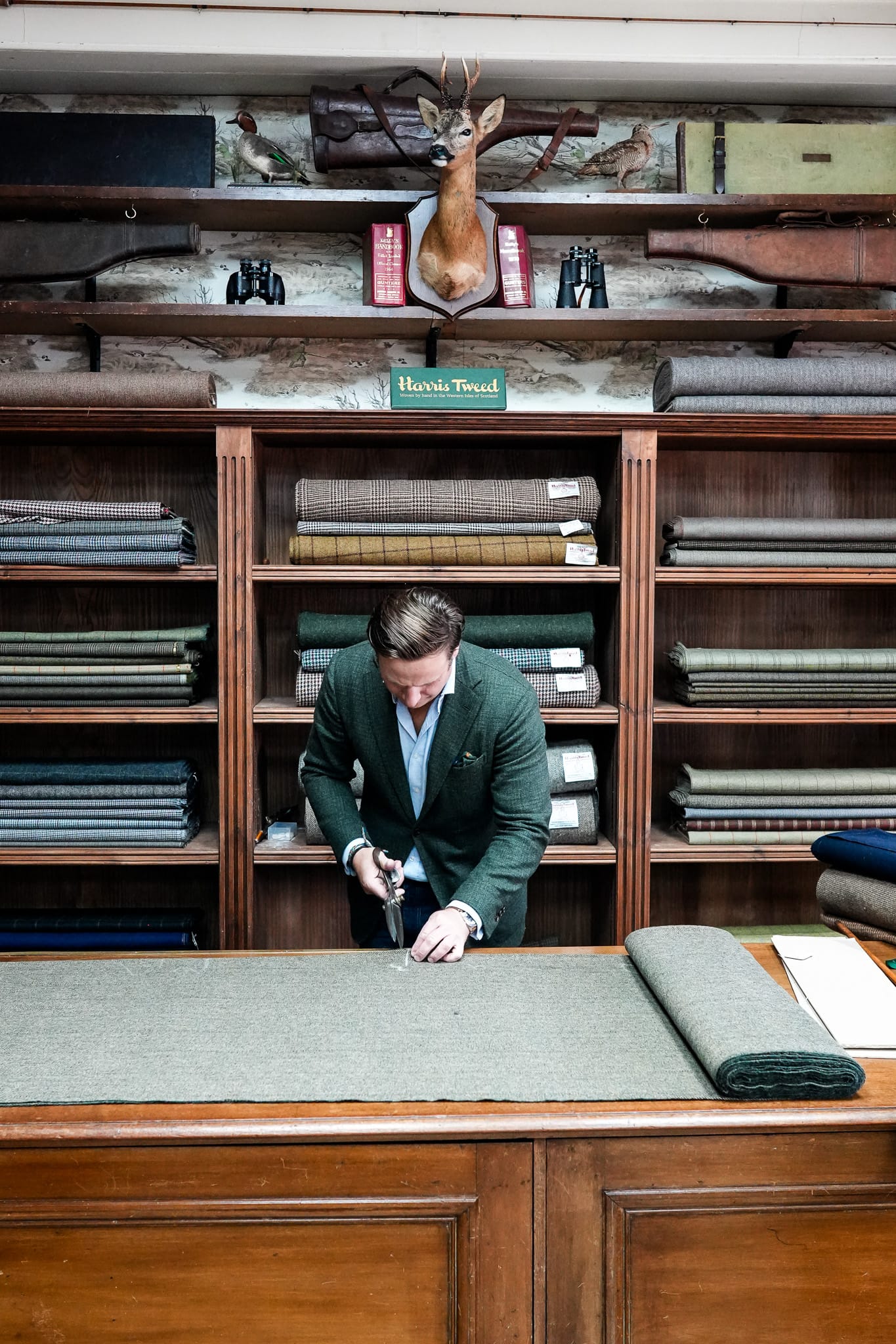 Campbell’s of Beauly owner John Sugden cutting tweed.