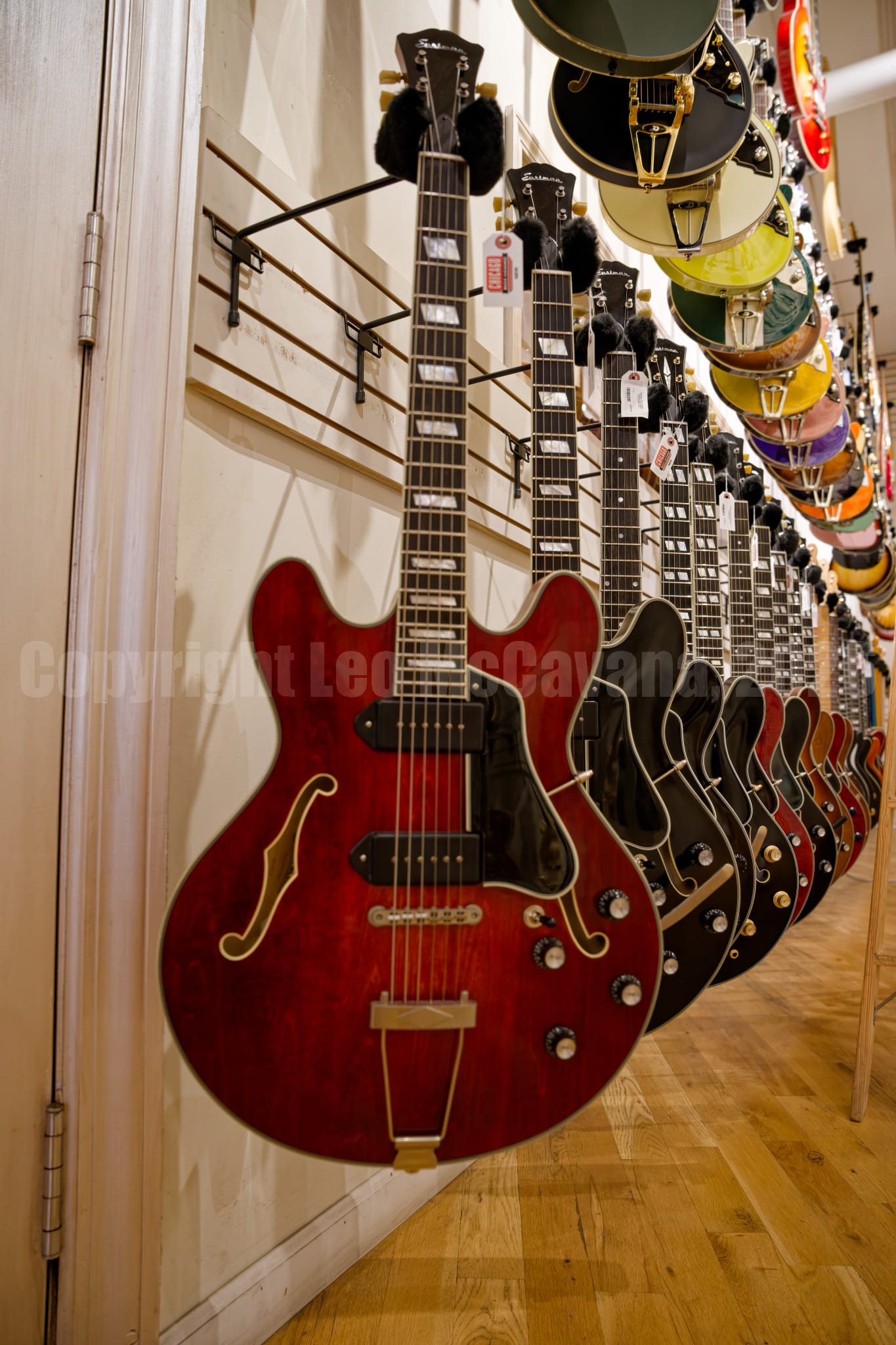 Long lines of guitars adorn the walls of Chicago Music Exchange