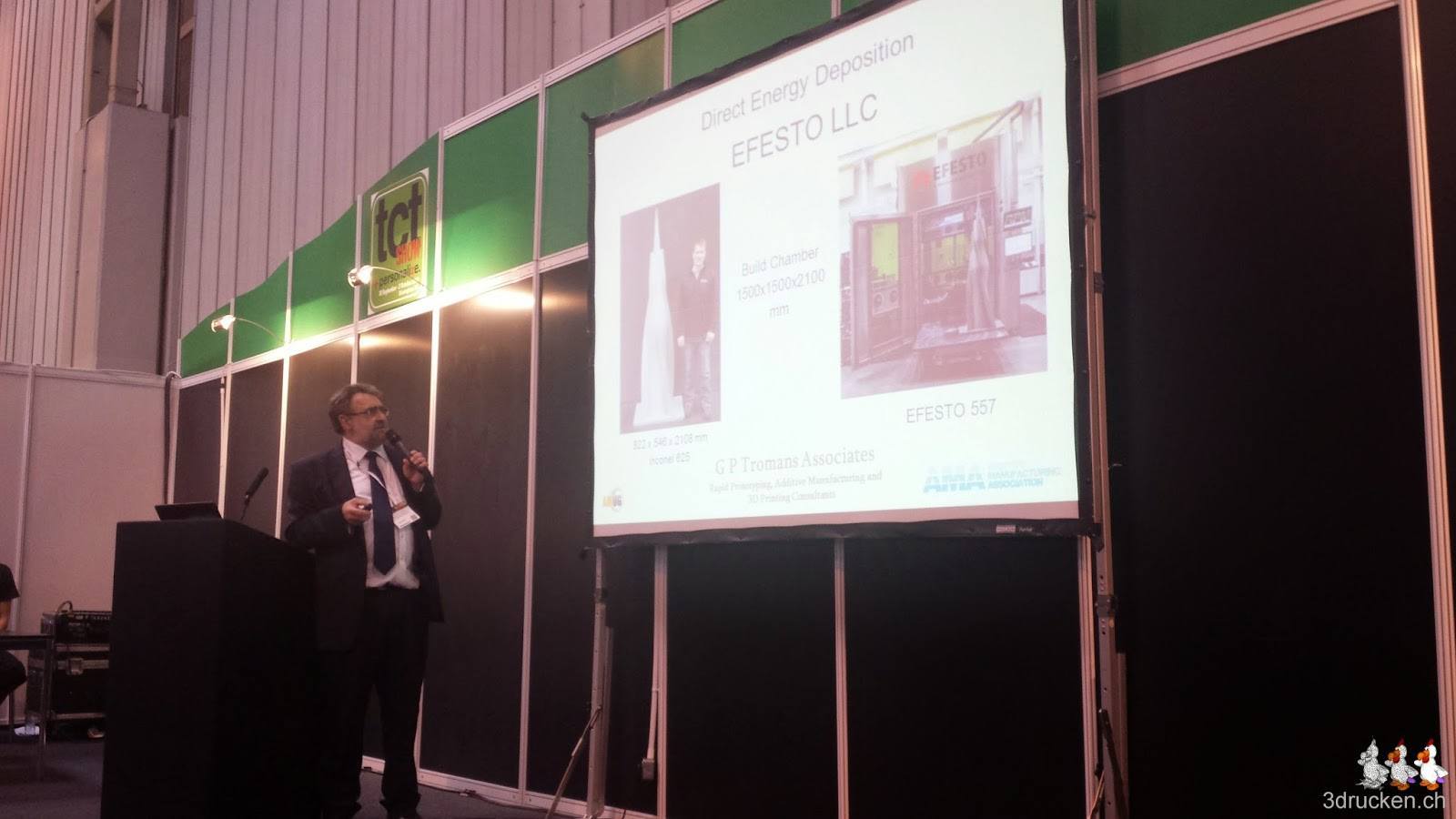 Foto der Folie mit dem grossen Metalldrucker an der TCT Show 2014 in Birmingham