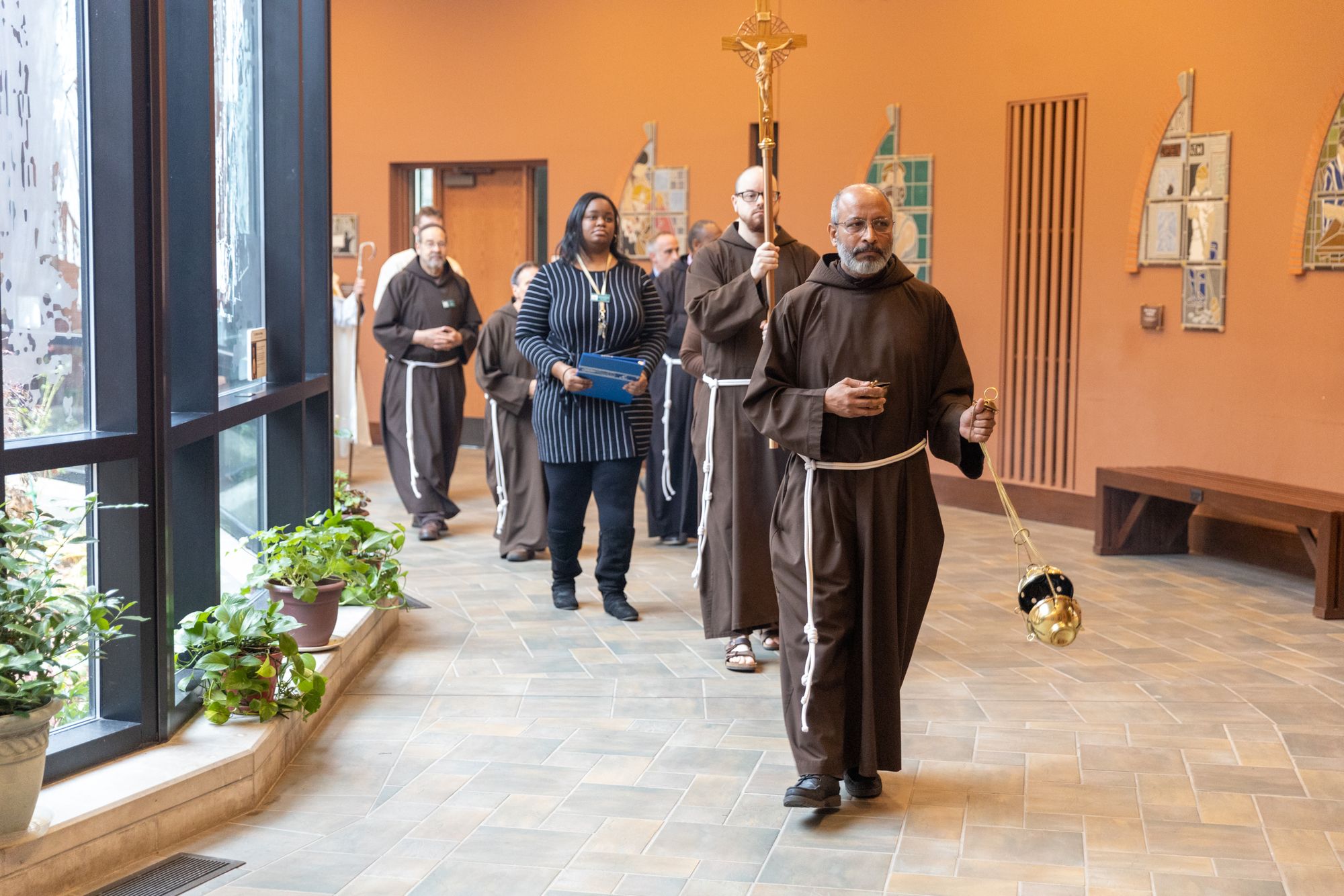 A group processes through the Solanus Casey Center.