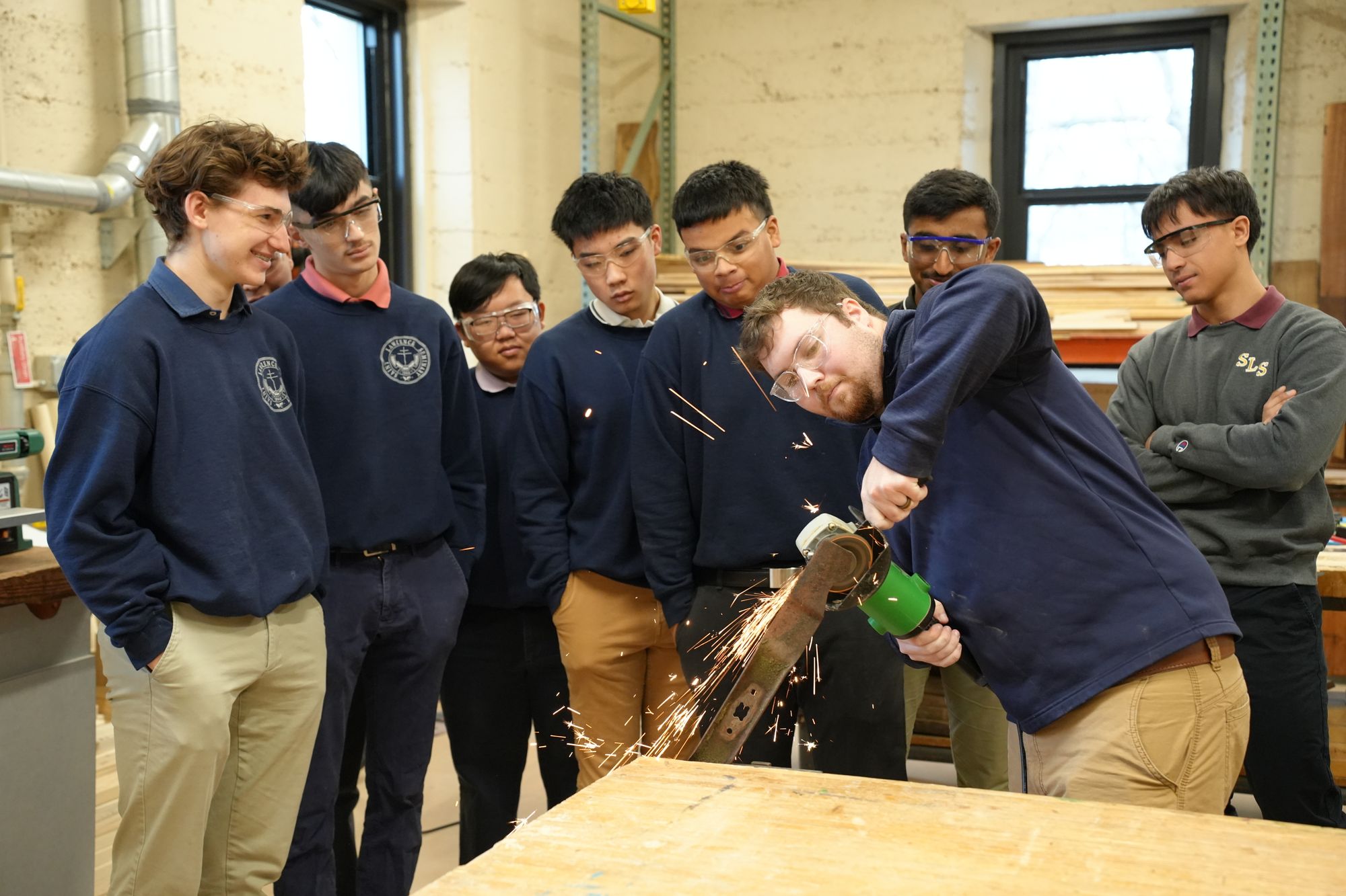 St. Lawrence students working in the metal shop.