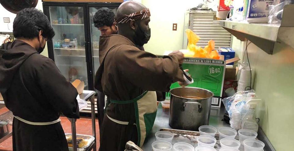 Capuchin Franciscan friars from the St. Clare Community in Chicago ministering at Port Ministries.