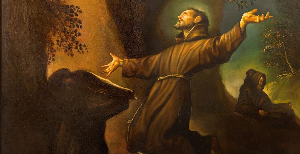 St. Francis of Assisi is depicted in this painting kneeling with his hands outstreched as he receives the Sacred Stigmata.