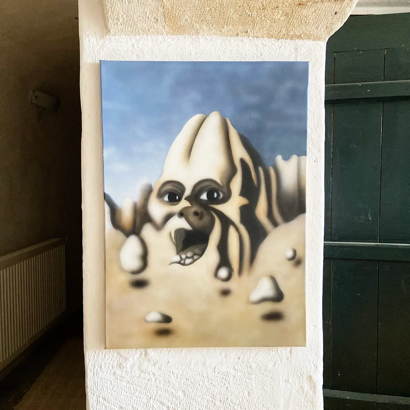 selver yıldırım's surreal painting of a mountain with a human-like face, inspired by cappadocia