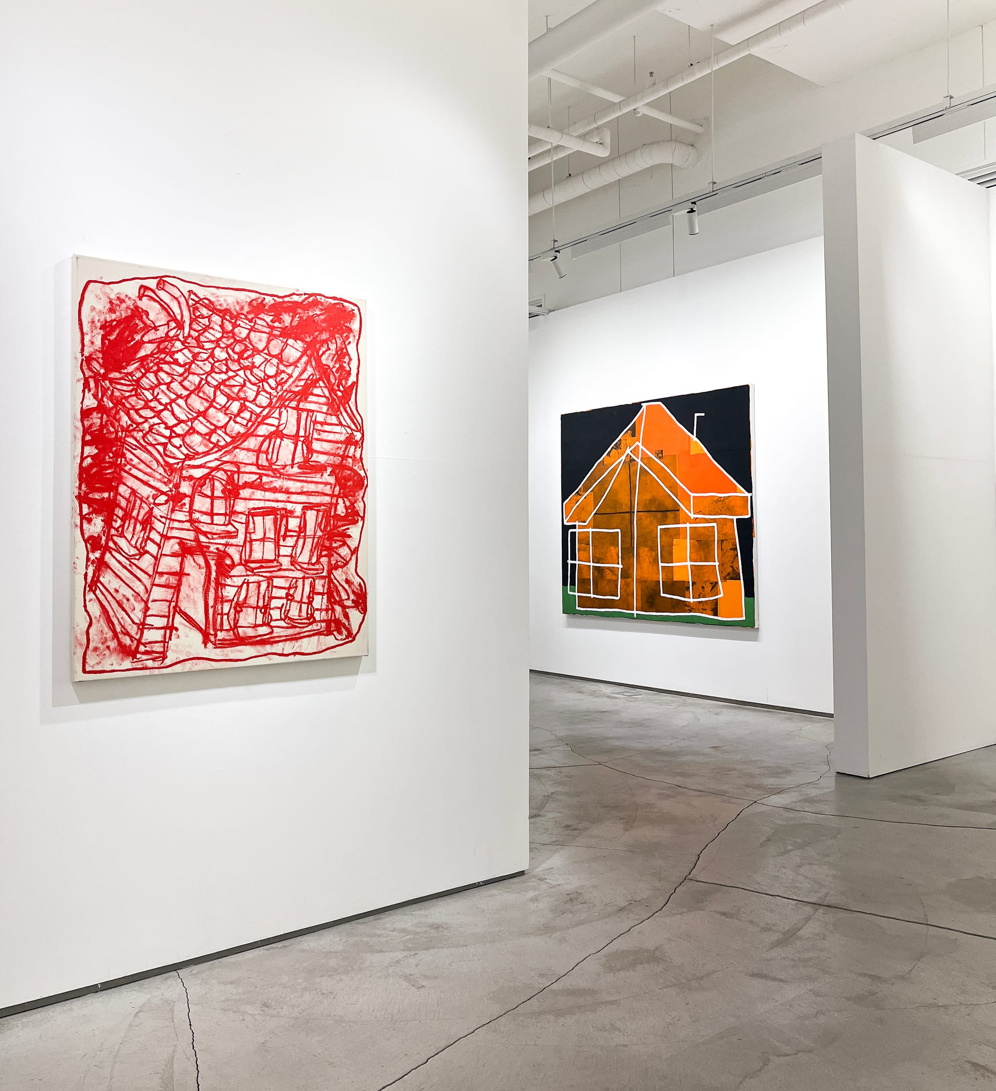 Installation view of works by Taylor A. White at G Gallery in Seoul. On the left, a red oil stick drawing of a warped house on cream-colored canvas hangs on a white wall. Around the corner, a second large painting in black, orange, and green shows a simplified geometric house with white outlines. Both works focus on architectural distortion and visual imbalance. The gallery has concrete floors and bright white walls.