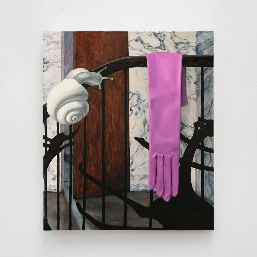 Oil painting titled “Traces” (2025) by emerging artist Li Jun, 70 × 60 cm, depicting a white snail shell and a bright pink cleaning glove against a marbled and wooden background, exhibited at Parallel Vienna 2025. Li Jun is a promising contemporary artist studying at the Academy of Fine Arts Vienna, known for her symbolic, surreal compositions exploring texture, contrast, and everyday objects.