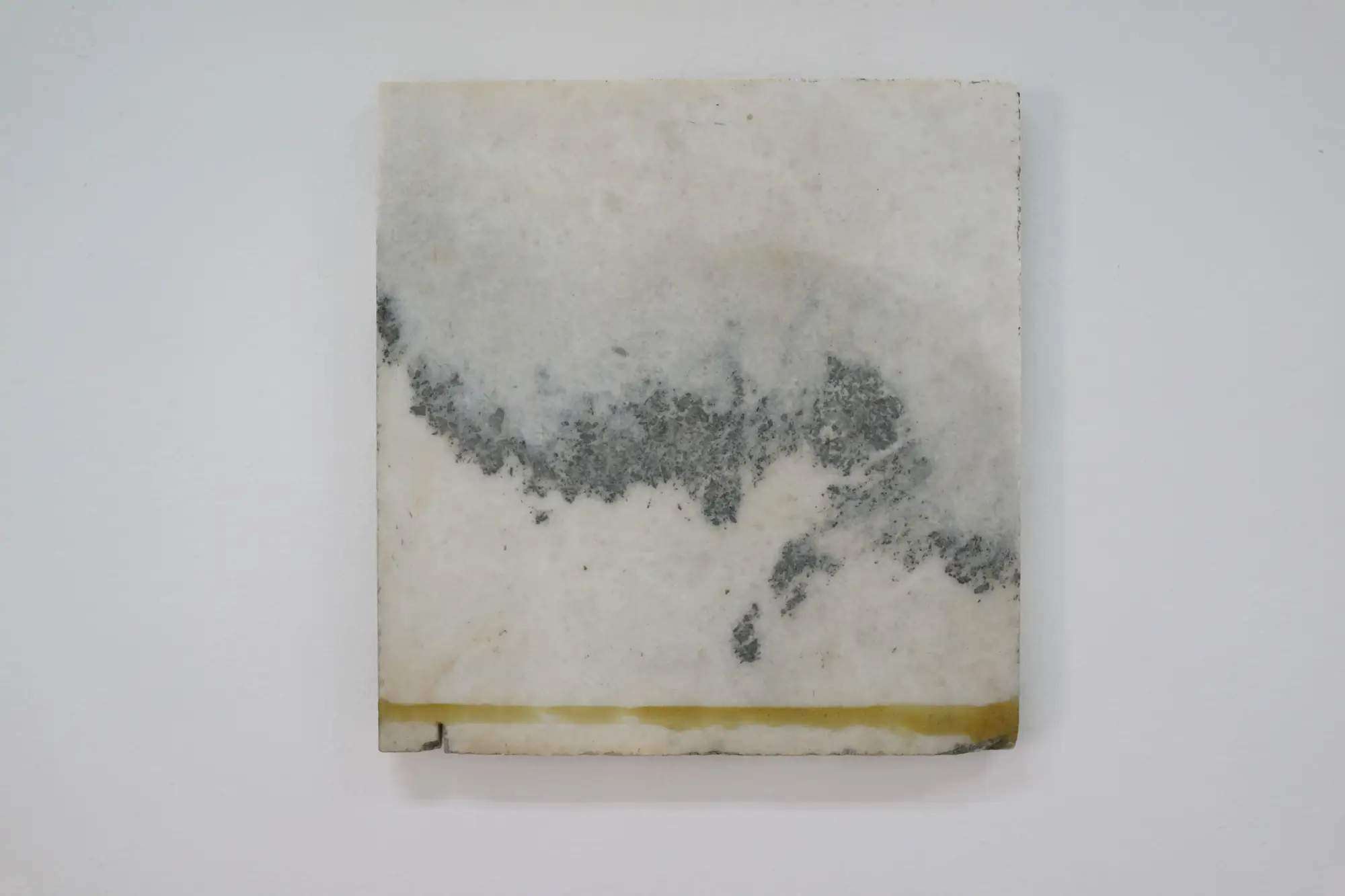 Close-up of a marble artwork by Brice Marden at Hydra School Projects 2025, Lithos Lethe. The work reflects the artist’s deep connection to Hydra Island, combining abstraction with natural stone textures