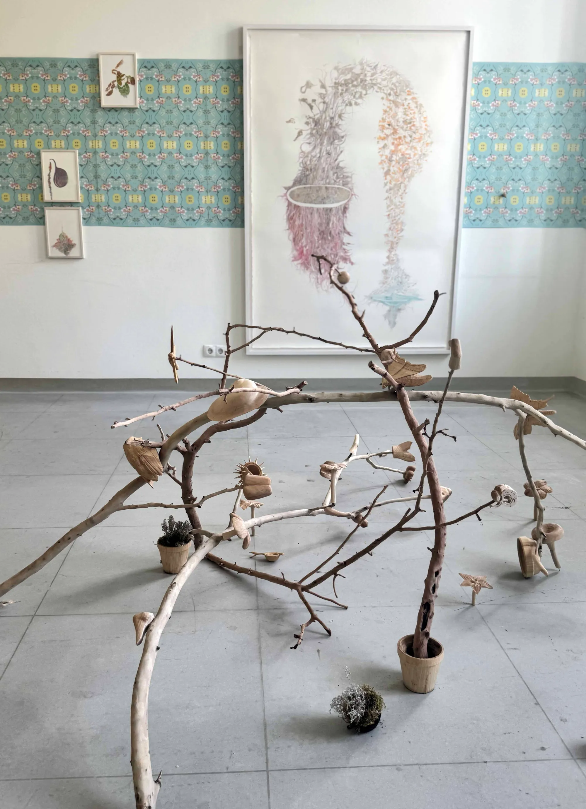 Parallel Vienna 2025: Installation by Gabriela Oberkofler, represented by Storm and Schooner, combining branches with small sculptural forms and detailed drawings, exhibited in the Gallery Statements section at the Otto Wagner Areal, Vienna.