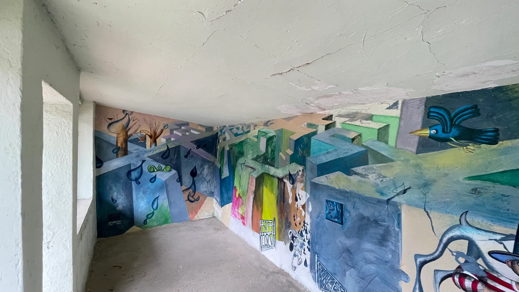 Martin Schuster wall painting, bus stop Podelwitz, geometric maze and bird motif.