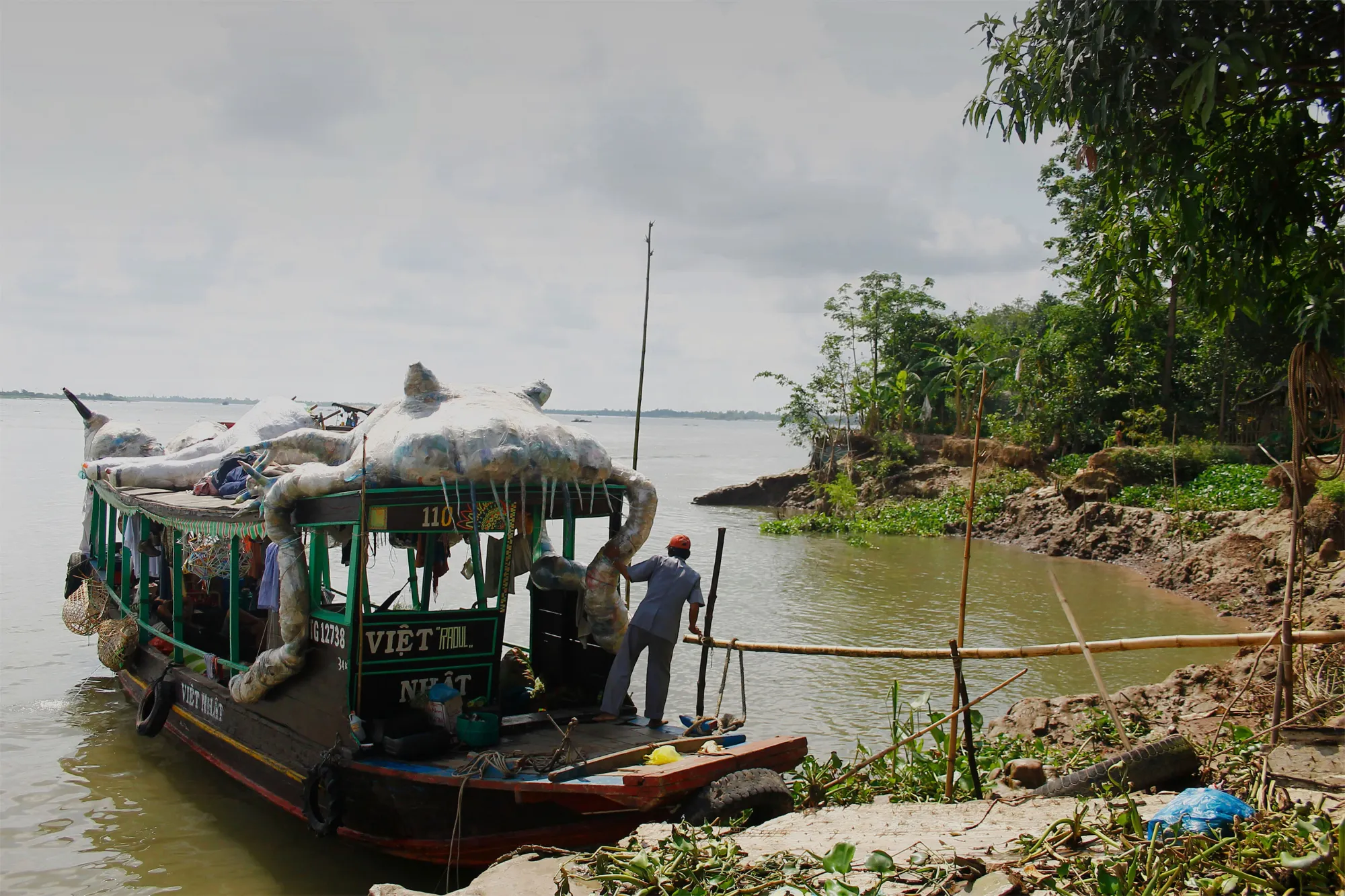 Martin Schuster installation, Fremdteilchen project on river boat in Vietnam, 2013.