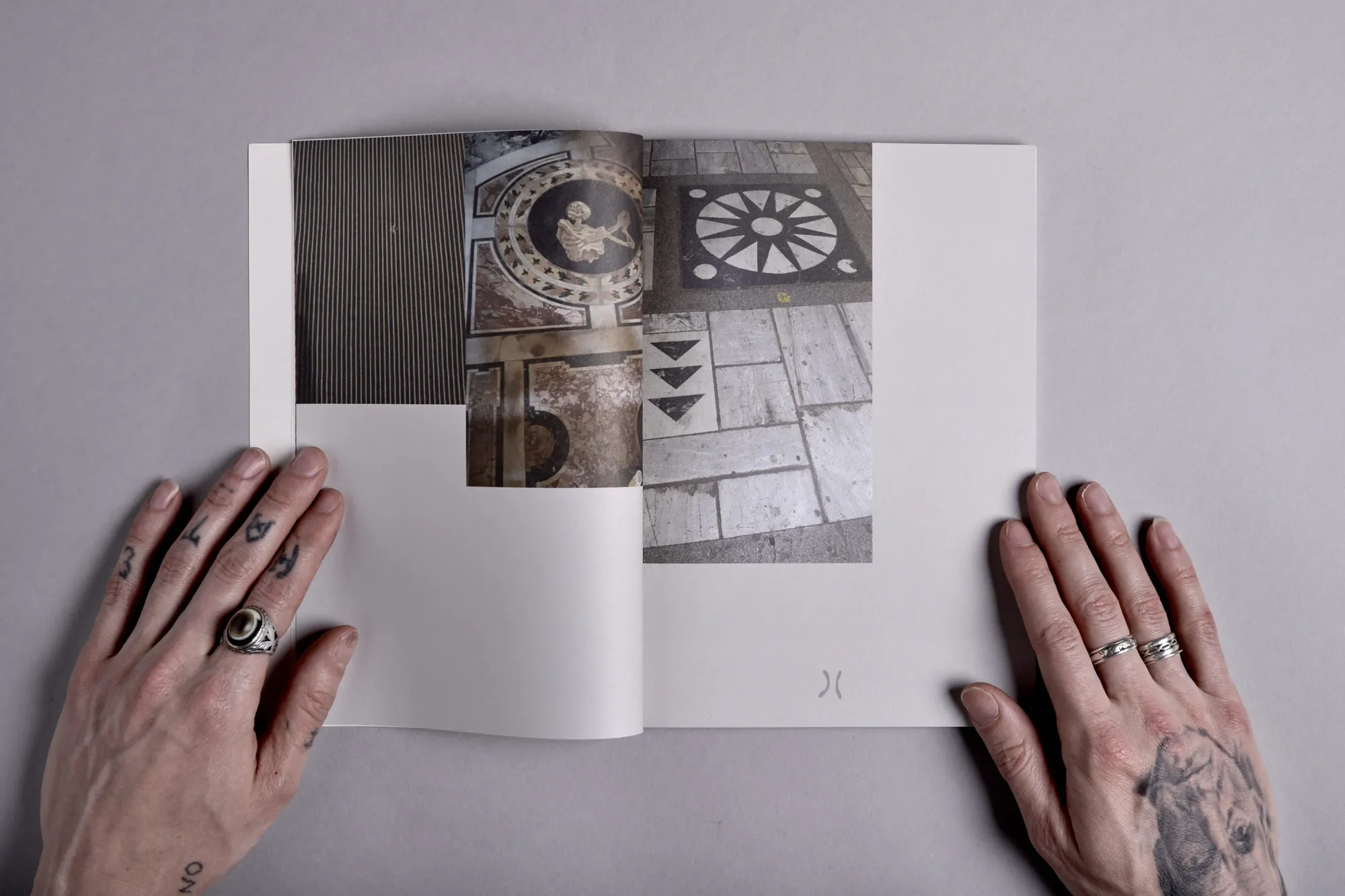 Matthias Esch, artist book catalogue spread showing floor patterns and mosaic references, photo by Marlene Zoe Burz.
