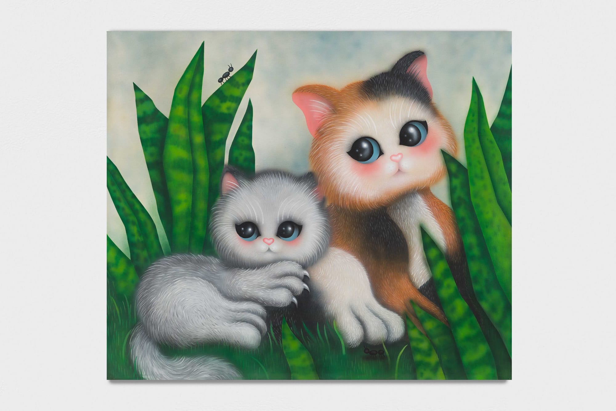 Figurative painting by Fátima de Juan depicting two wide-eyed animal figures nestled among green leaves, rendered in soft gradients and pastel tones that emphasize tenderness and intimacy.