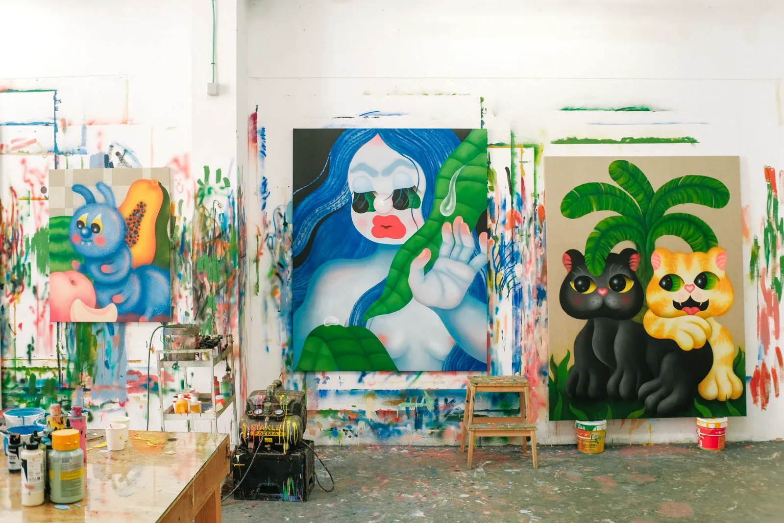  Fátima de Juan, Artist Studio view of surrounded by recent figurative paintings, showing her working environment with completed and in-progress canvases.